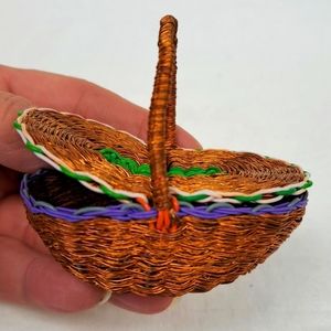 Miniature handwoven copper wire picnic basket with handle